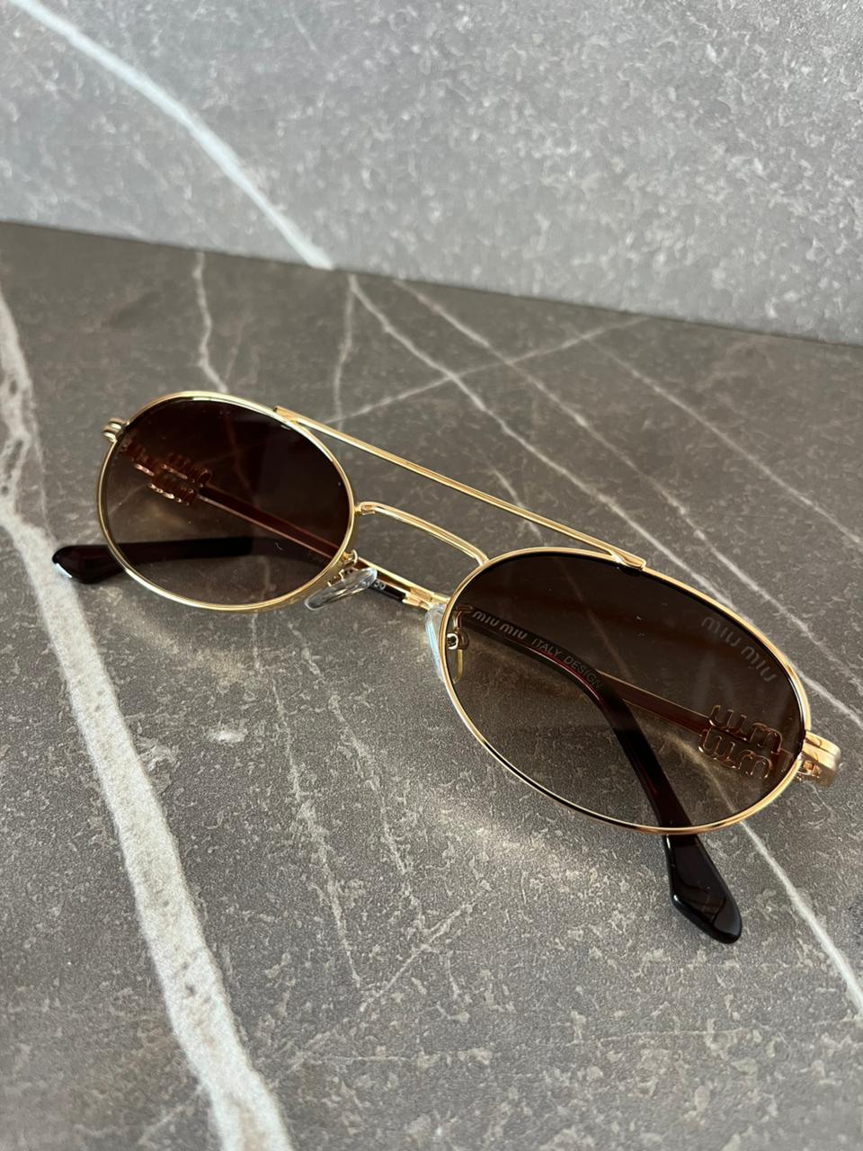 Gafas de sol Miu Miu  Metálicas Ovaladas