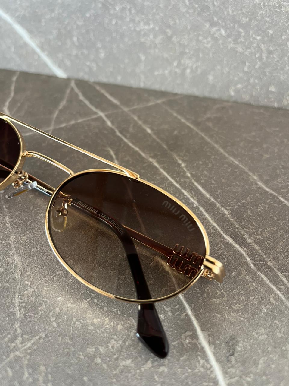 Gafas de sol Miu Miu  Metálicas Ovaladas