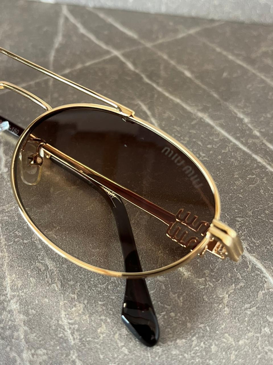 Gafas de sol Miu Miu  Metálicas Ovaladas