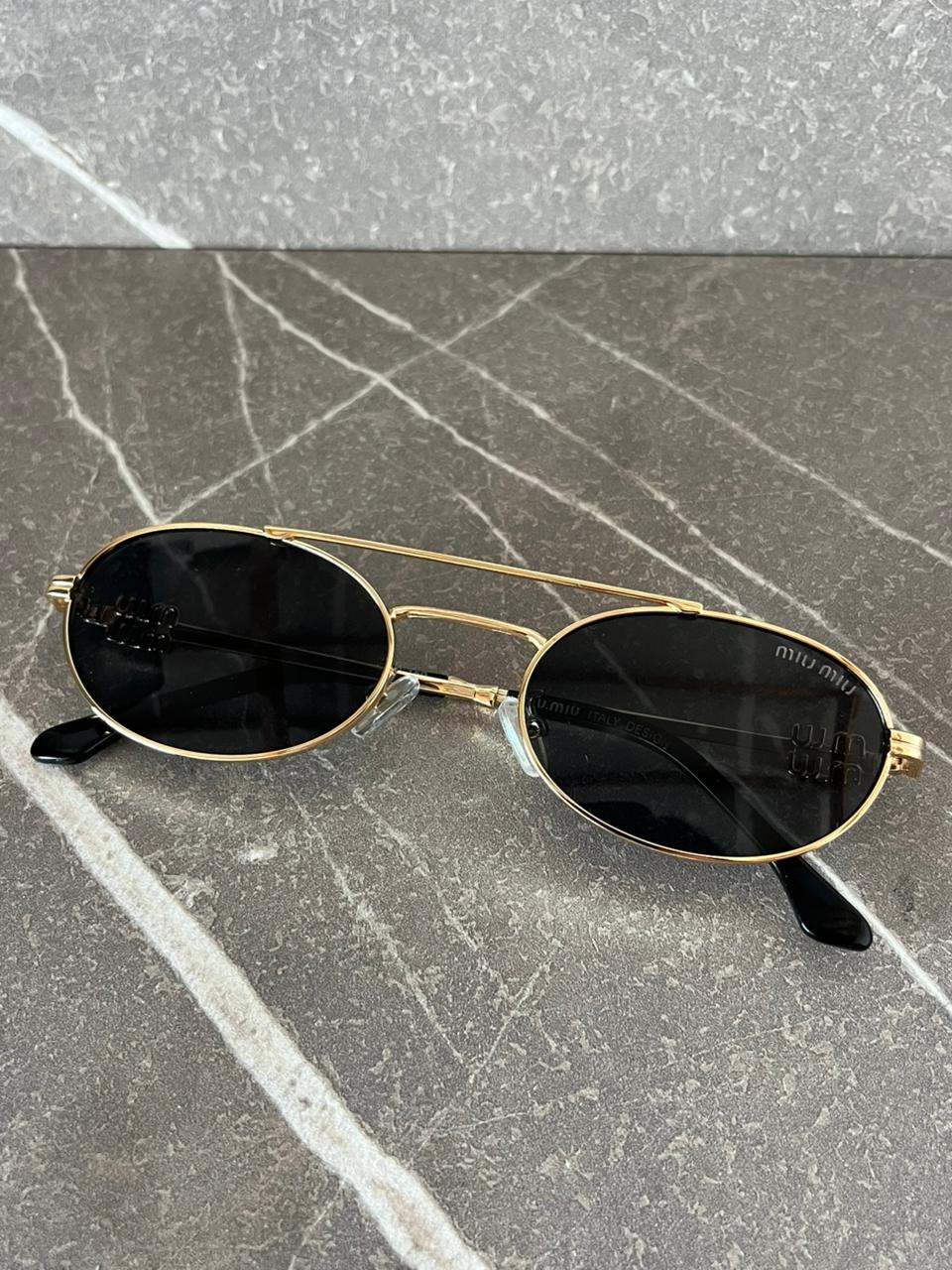 Gafas de sol Miu Miu  Metálicas Ovaladas
