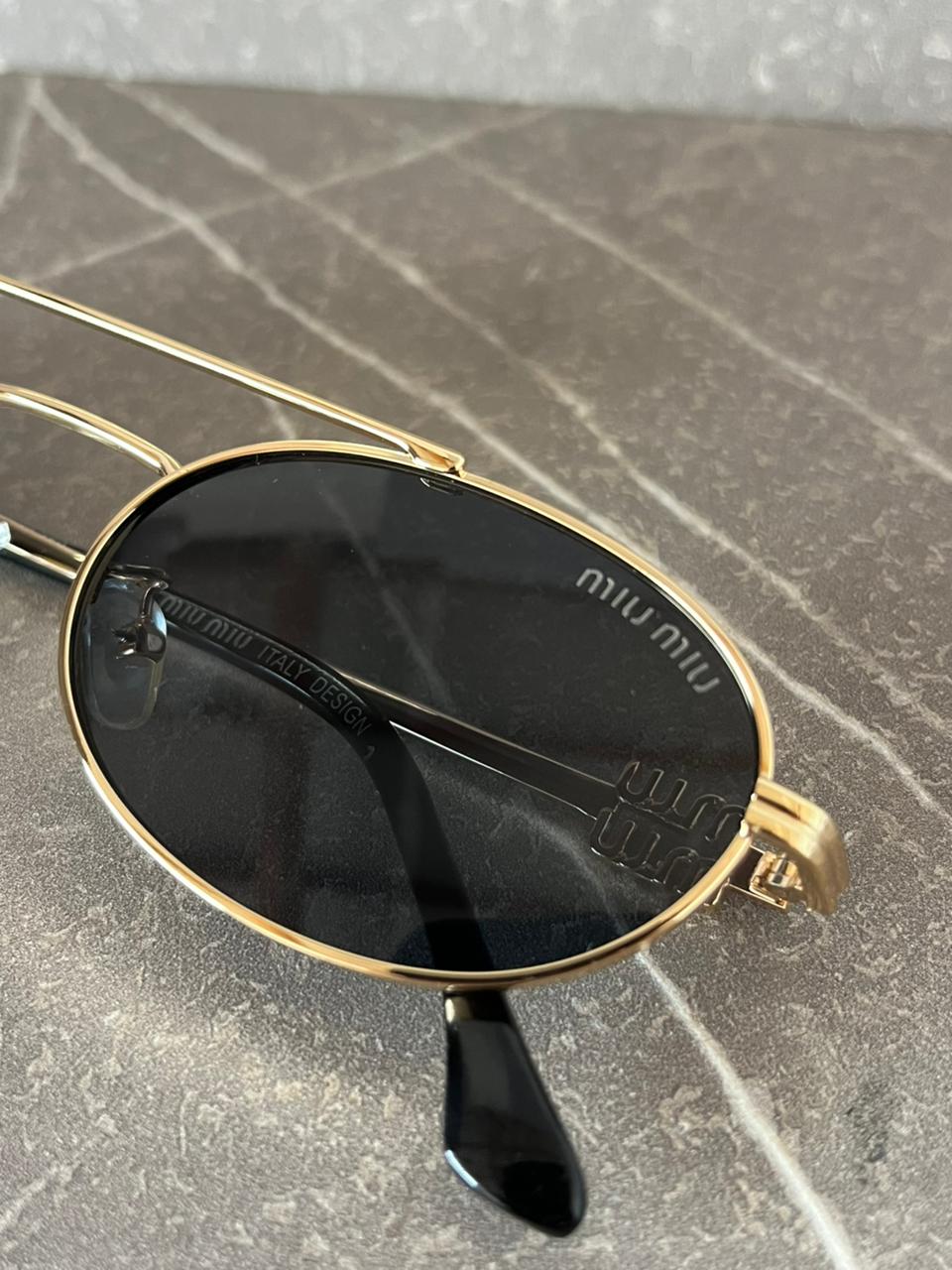 Gafas de sol Miu Miu  Metálicas Ovaladas